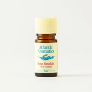 Bottle of Atlantic Aromatics Rose Absolute essential oil on a white background