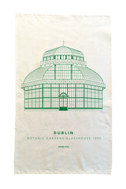 Tea towel with green botanical garden glasshouse design on a white background