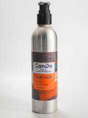 Silver bottle of CanDo body wash with a label on a white background