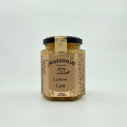 A jar of Crossogue Lemon Curd with a label that includes the product name and a brief description, set against a white background.