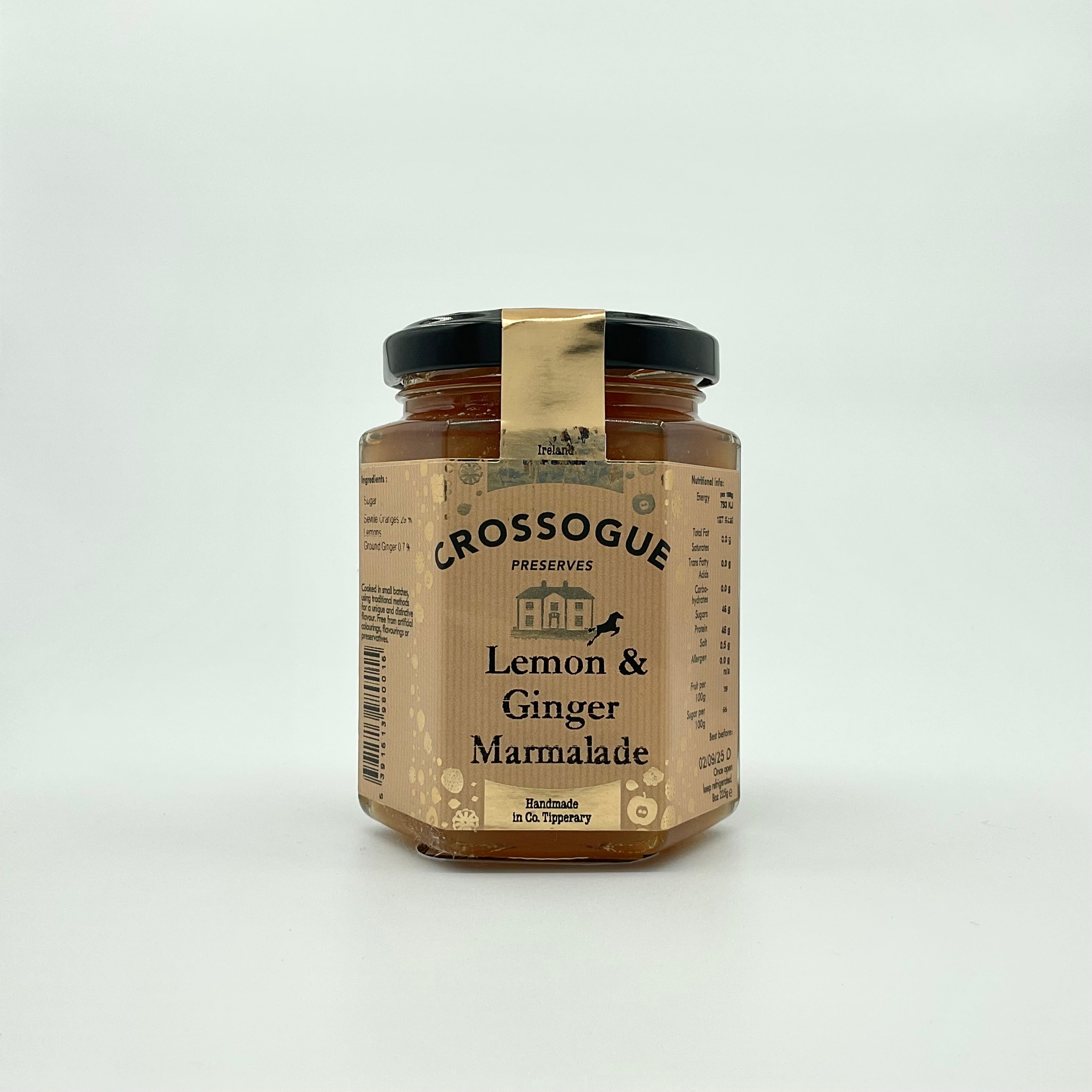 A jar of Crossogue Lemon & Ginger Marmalade with a label that includes the product name and a brief description.