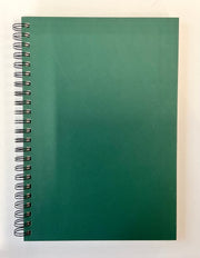 Green spiral-bound notebook on a white background