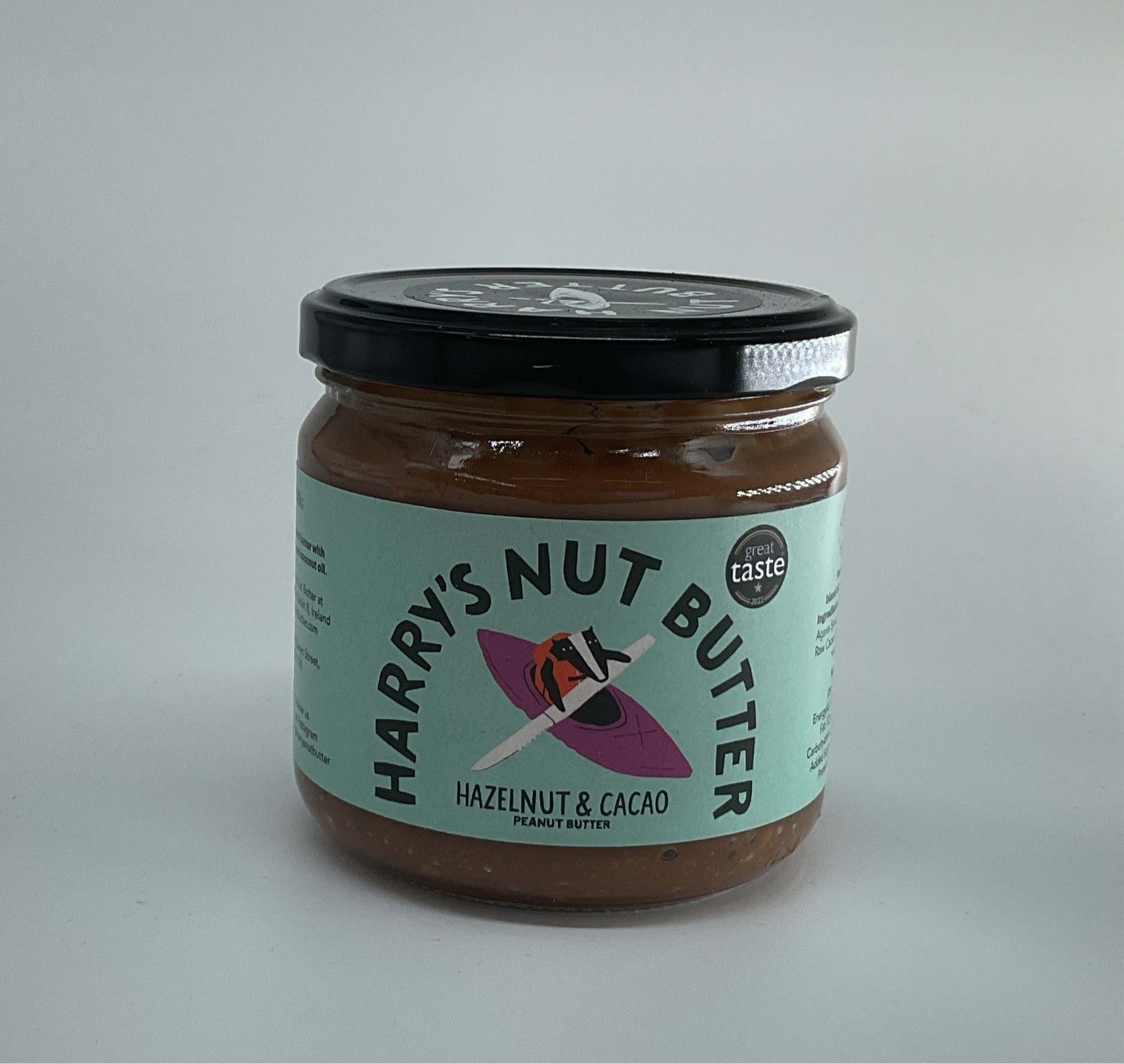 Jar of Harry's Nut Butter Hazelnut & Cacao on a gray background