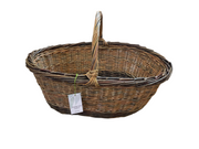Wicker basket with a handle on a white background