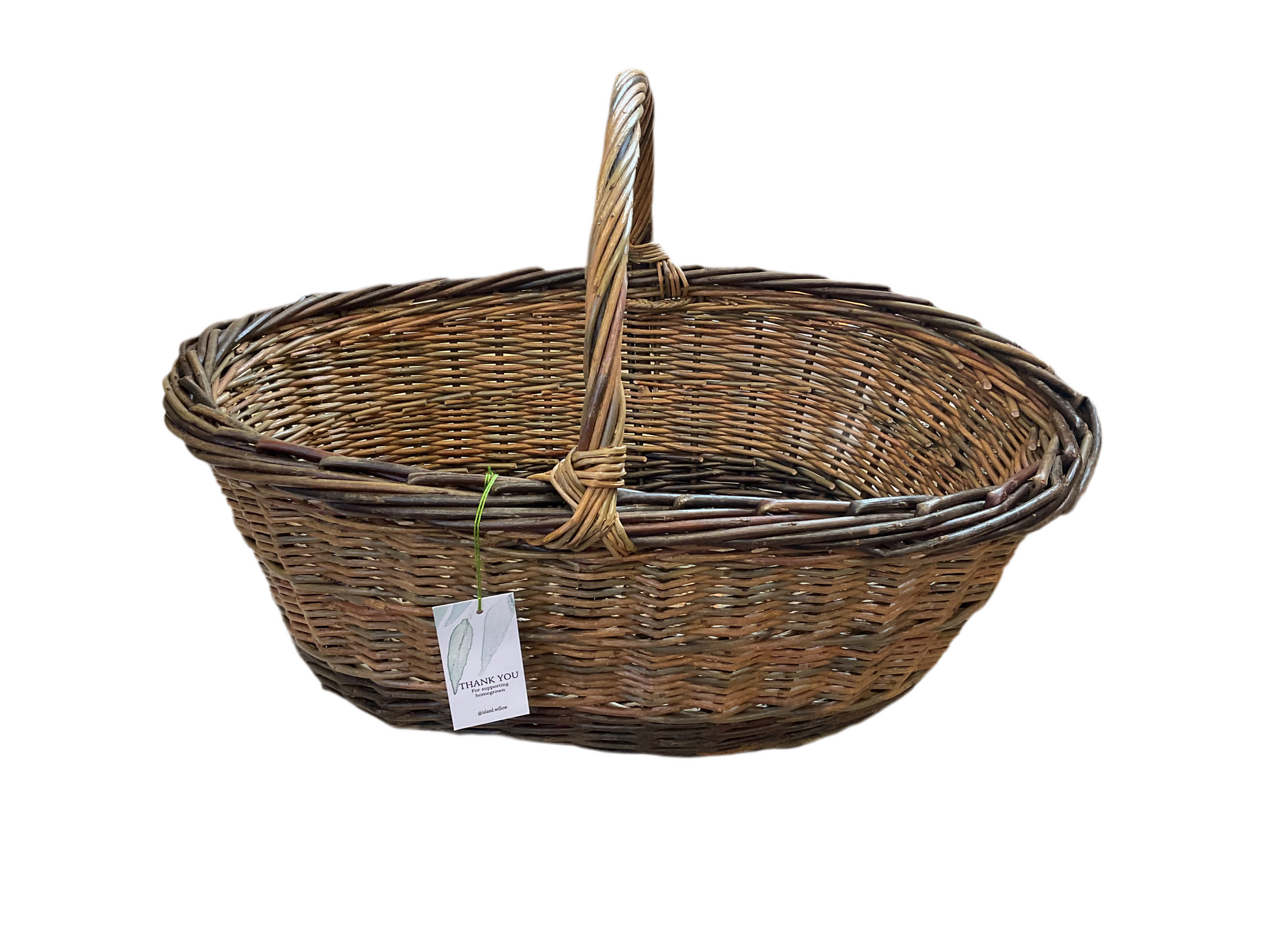 Wicker basket with a handle on a white background