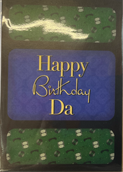 A greeting card with a blue and green pattern, featuring the text 'Happy Birthday Da' in golden letters.