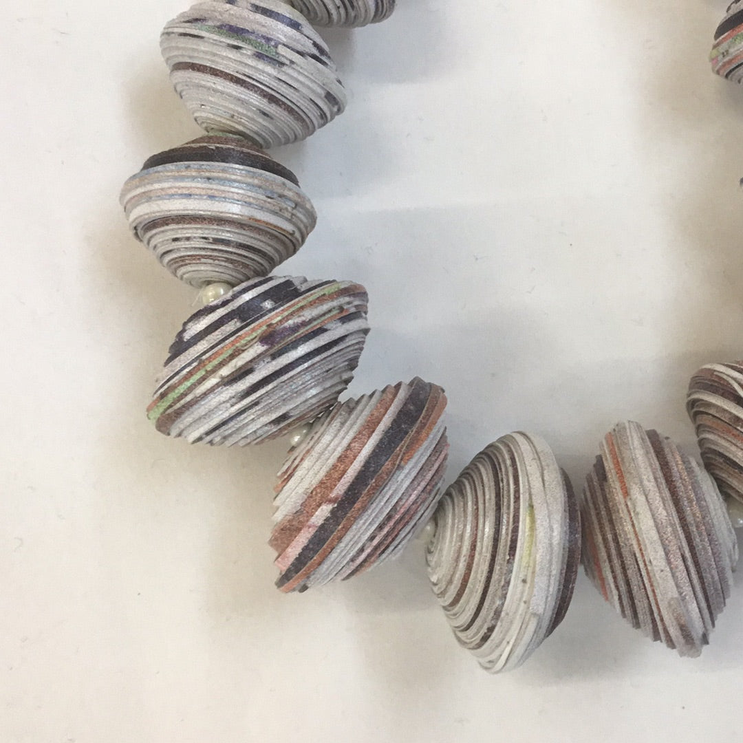 grey beaded necklace made from recycled newspapers
