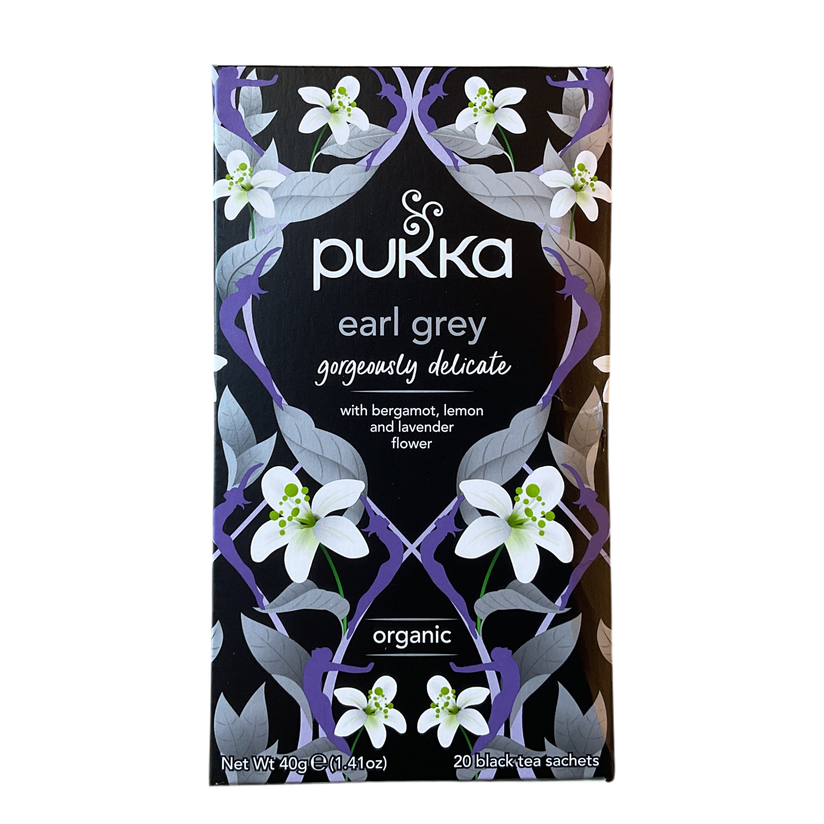 Packaging of Pukka Earl Grey tea bags with a floral design predominantly in purple and white colors.