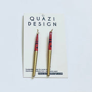 Pair of earrings on a Quazi Design card with a white background