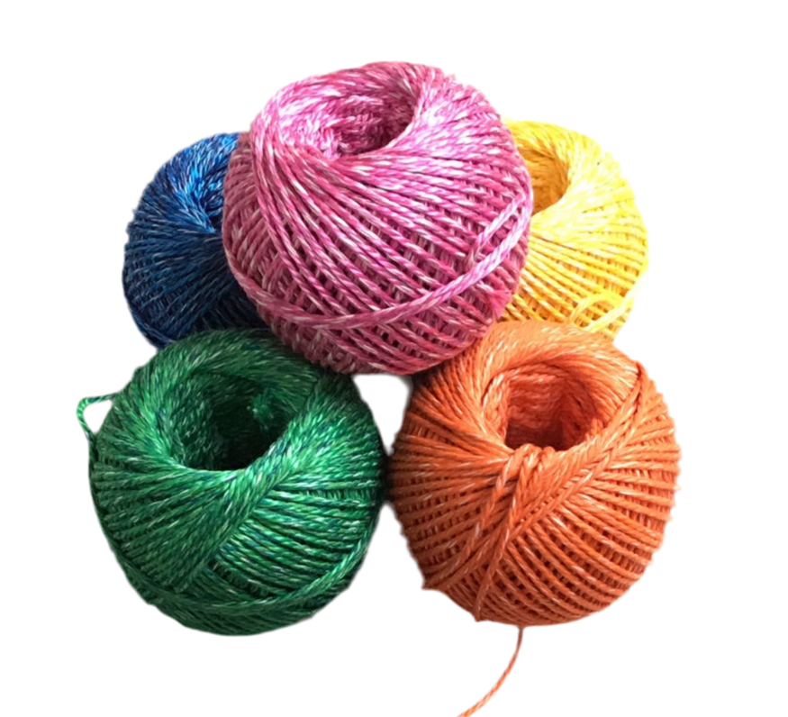 Five colorful balls of yarn on a white background