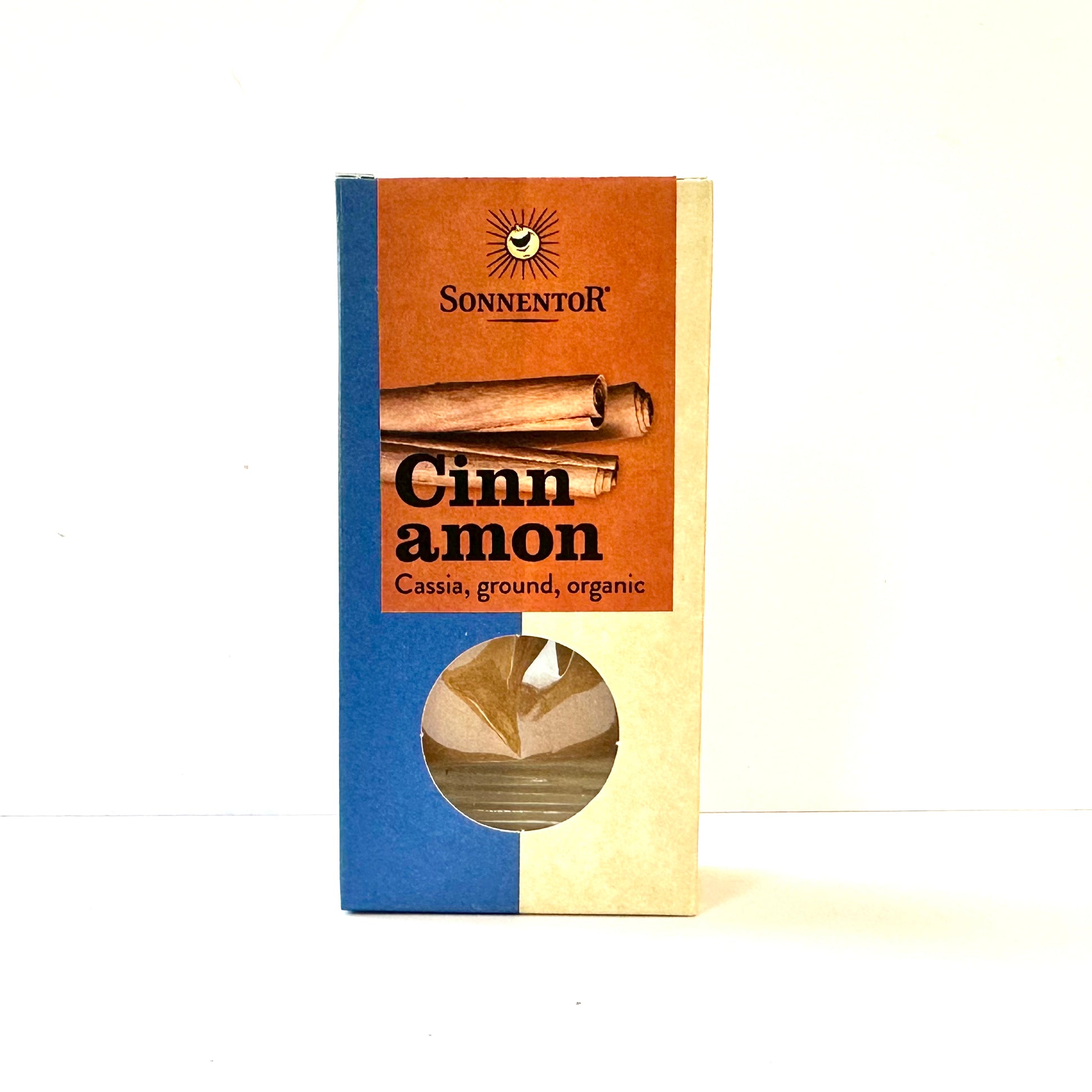 Packaging of Sonnentor Organic Cassia Ground Cinnamon with a clear window showing the cinnamon powder inside.