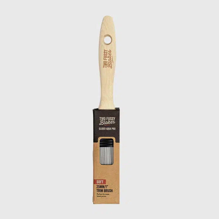 Two Fussy Blades trim brush with packaging on a white background