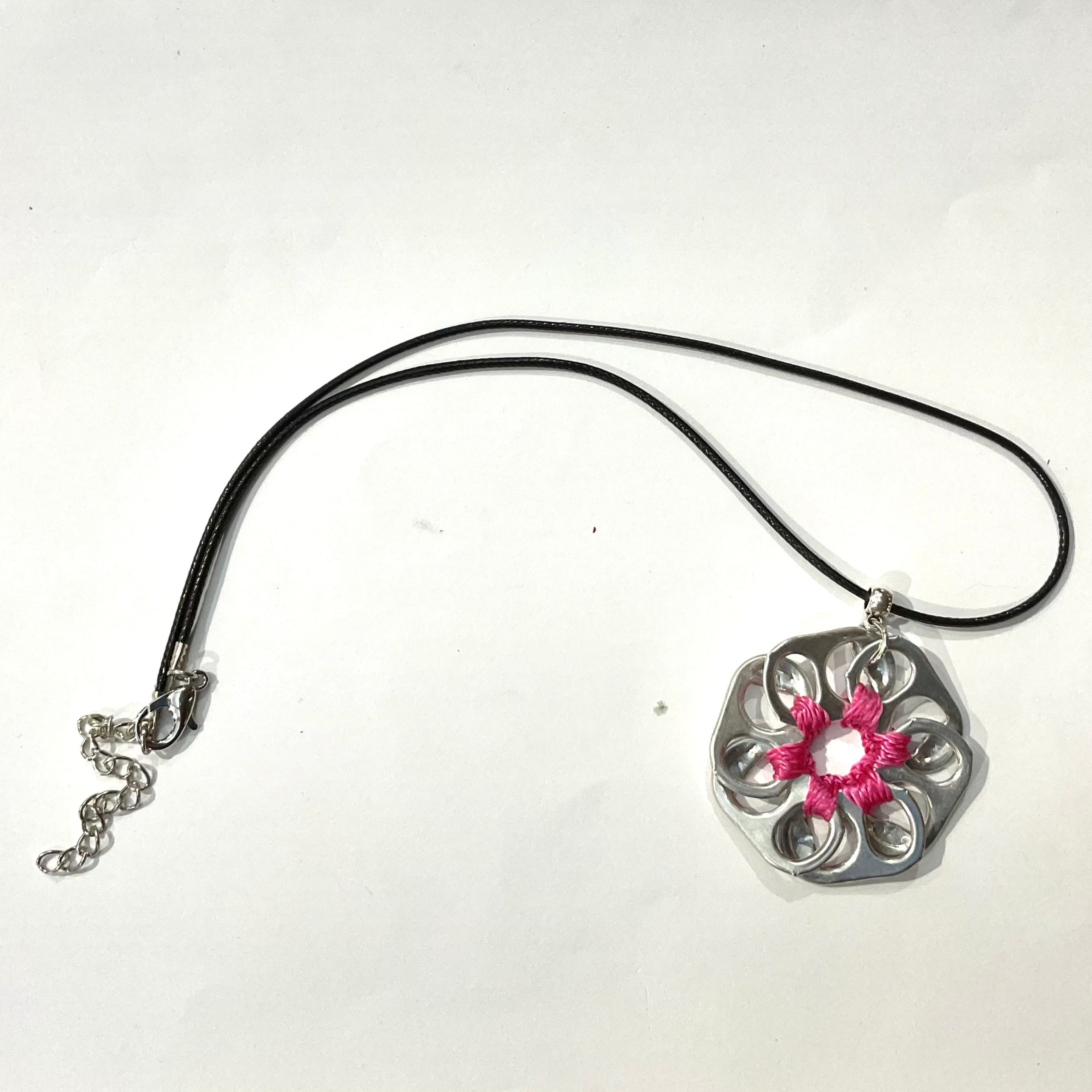can pull necklace made with pink thread